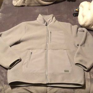FIGS grey fleece jacket.
